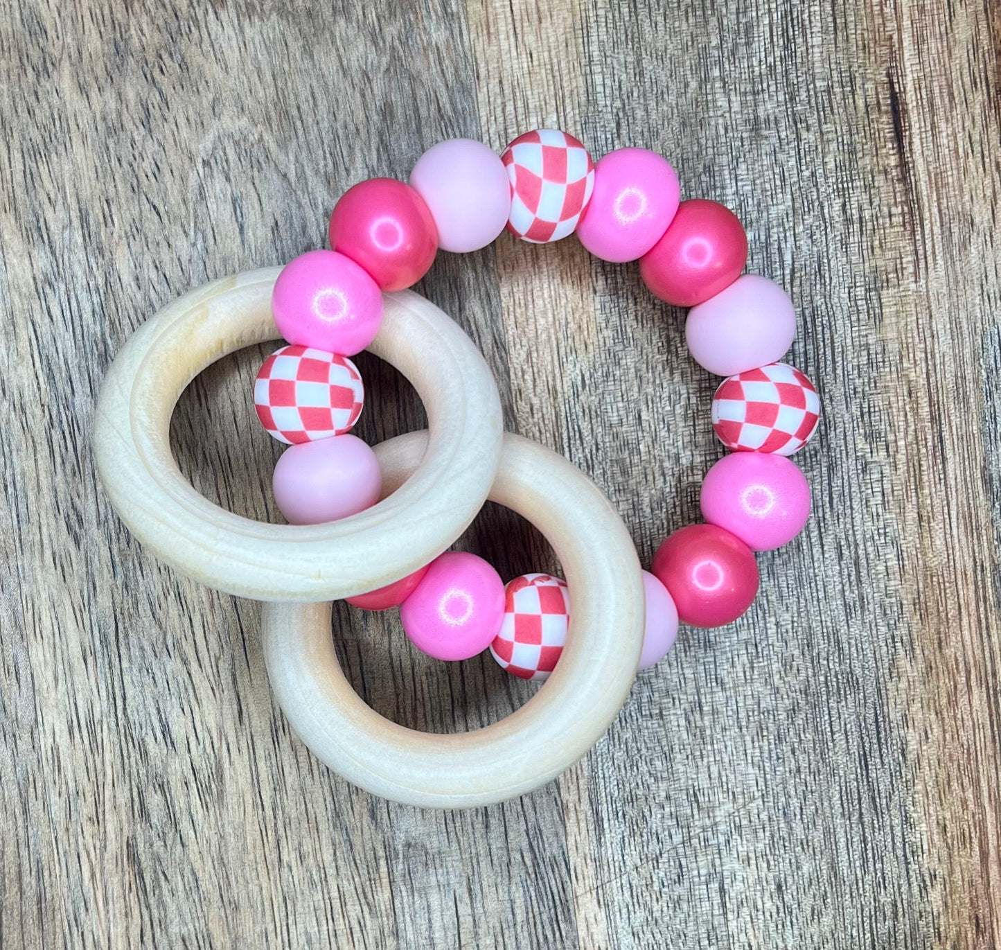 Triple pink checkers teether ring