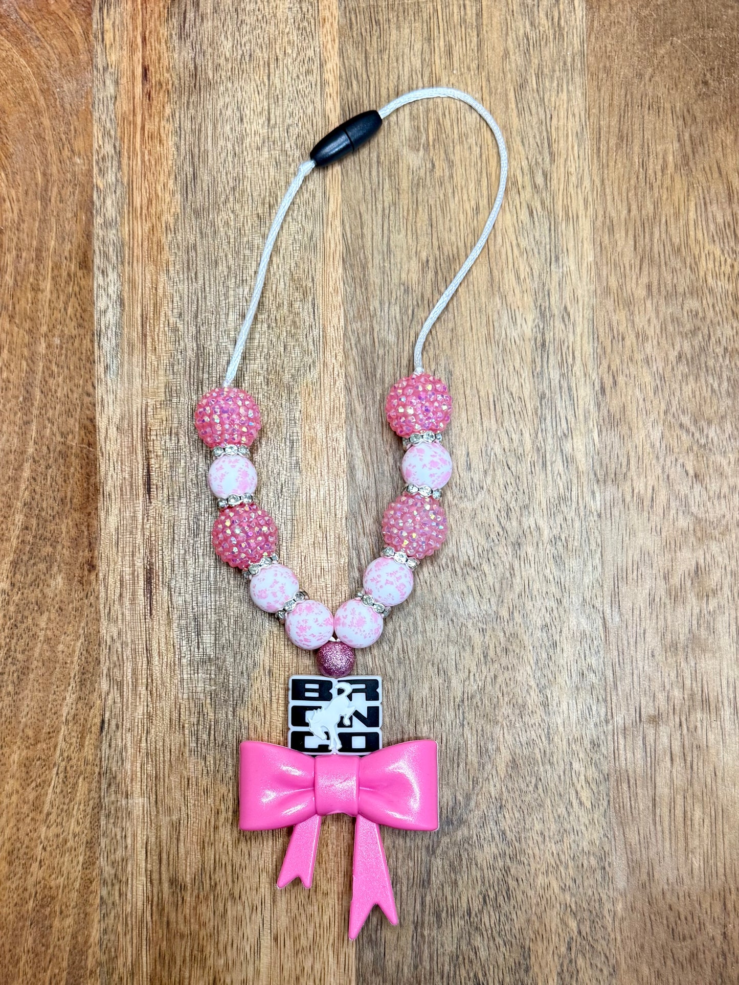 Pink bronco chunky boujee&bling bow carcharms charm