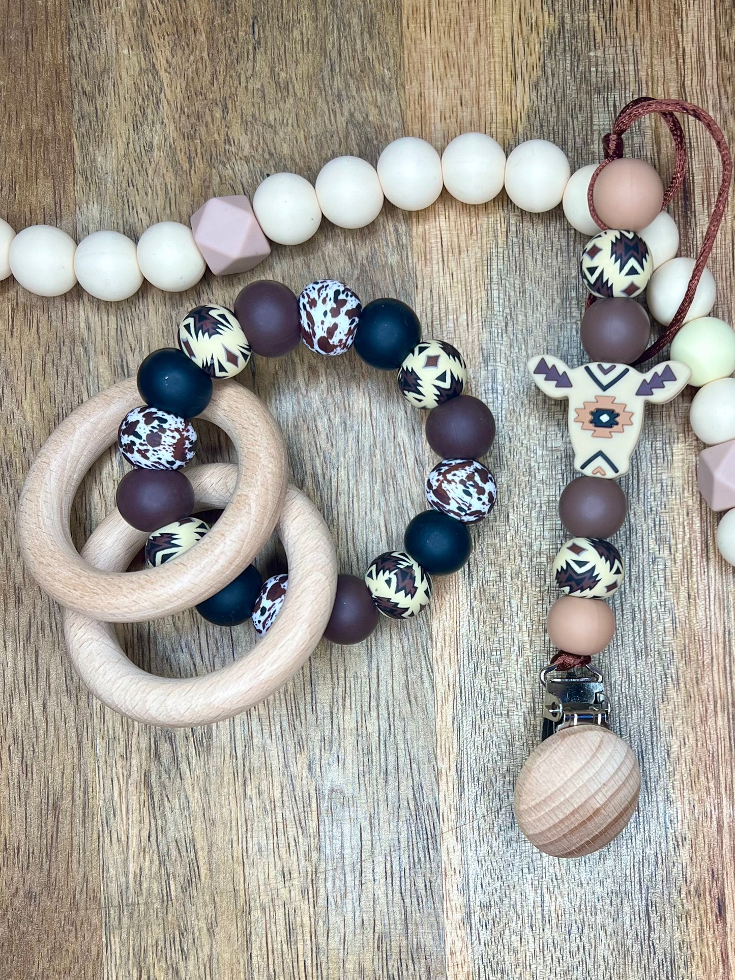 Tan Aztec Ollie pacifier clip + teether ring set
