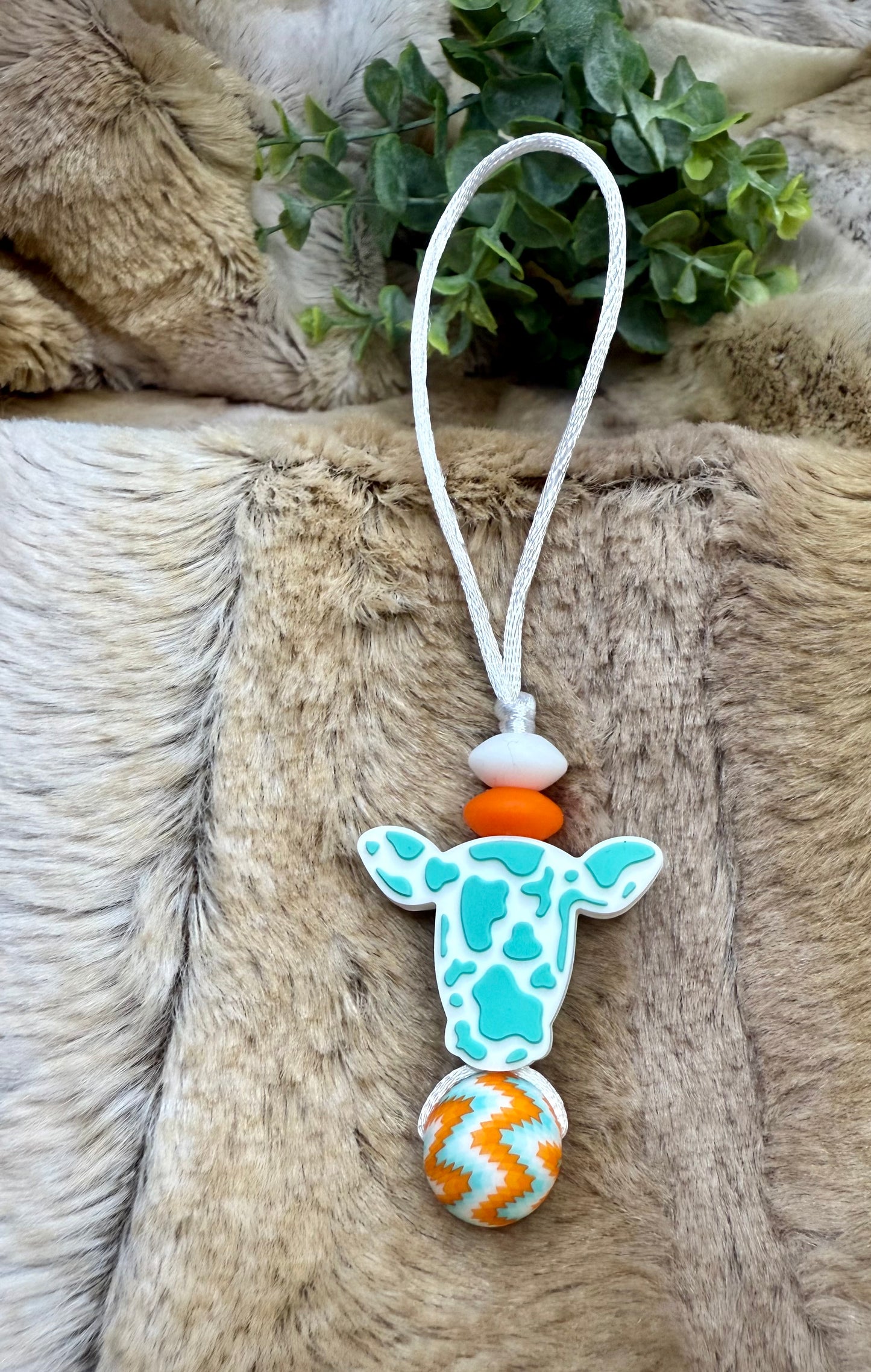 Teal cow zipper bag pull