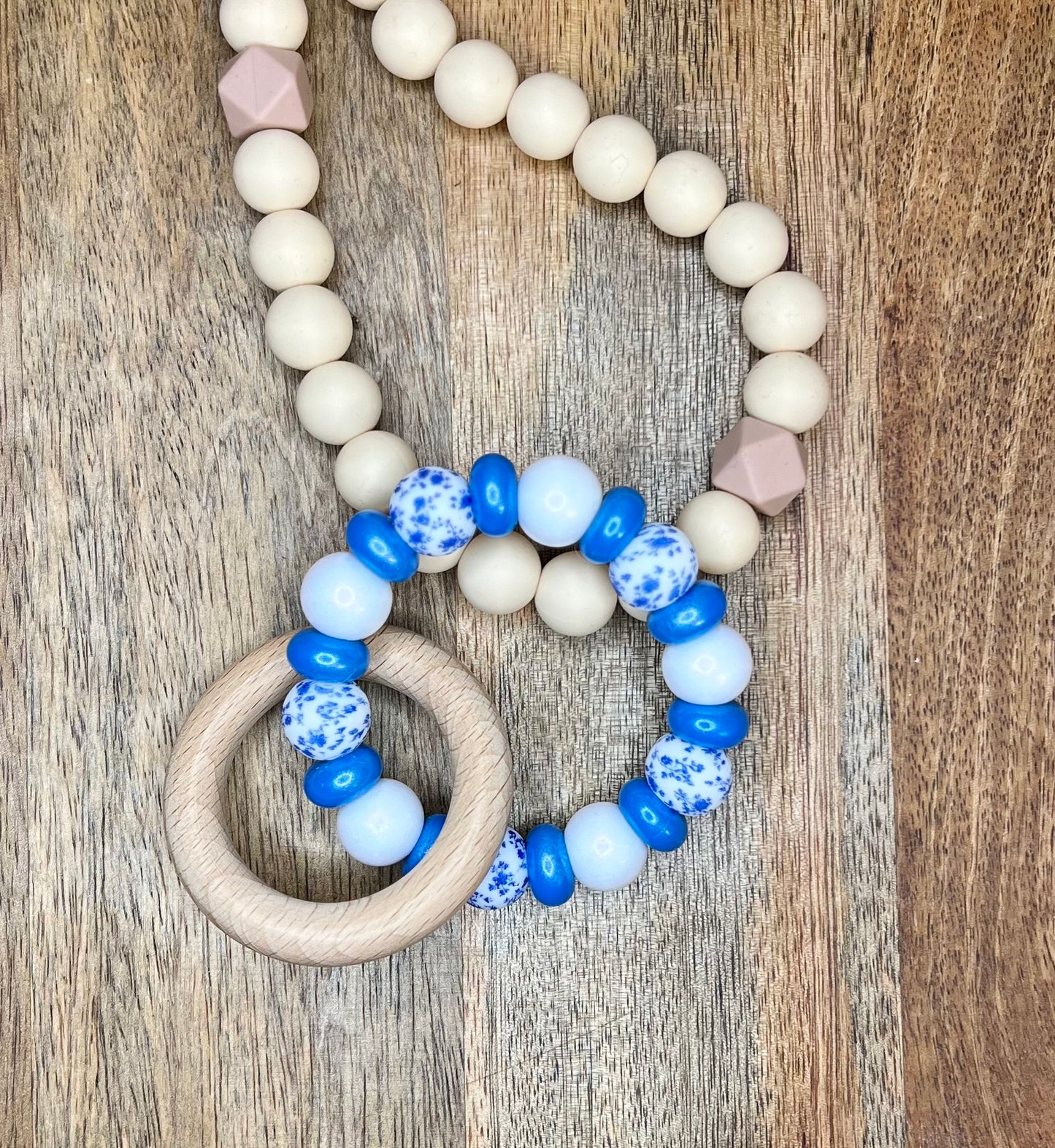 Blue rosette abacus teether ring