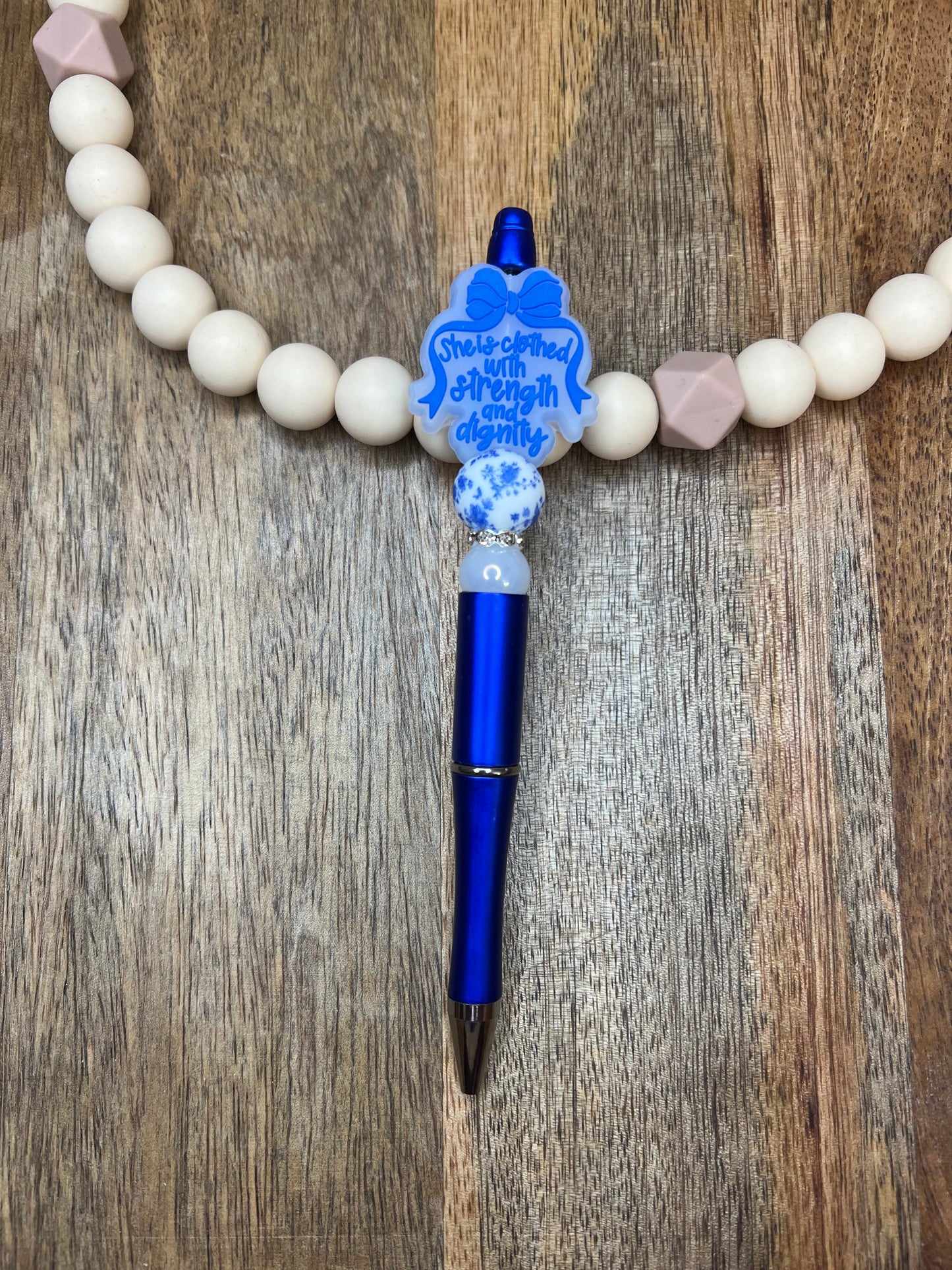 She is clothed in strength pen
