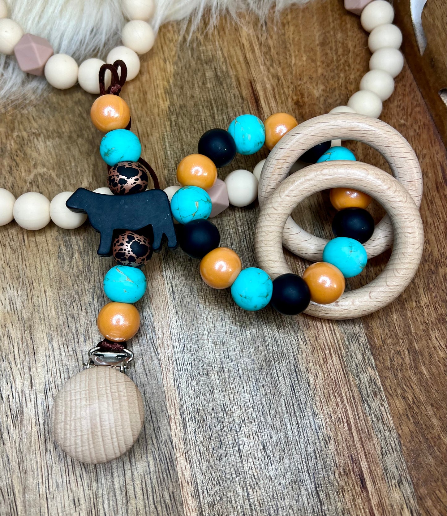 Rust&turq cow pacifier clip + teether ring set