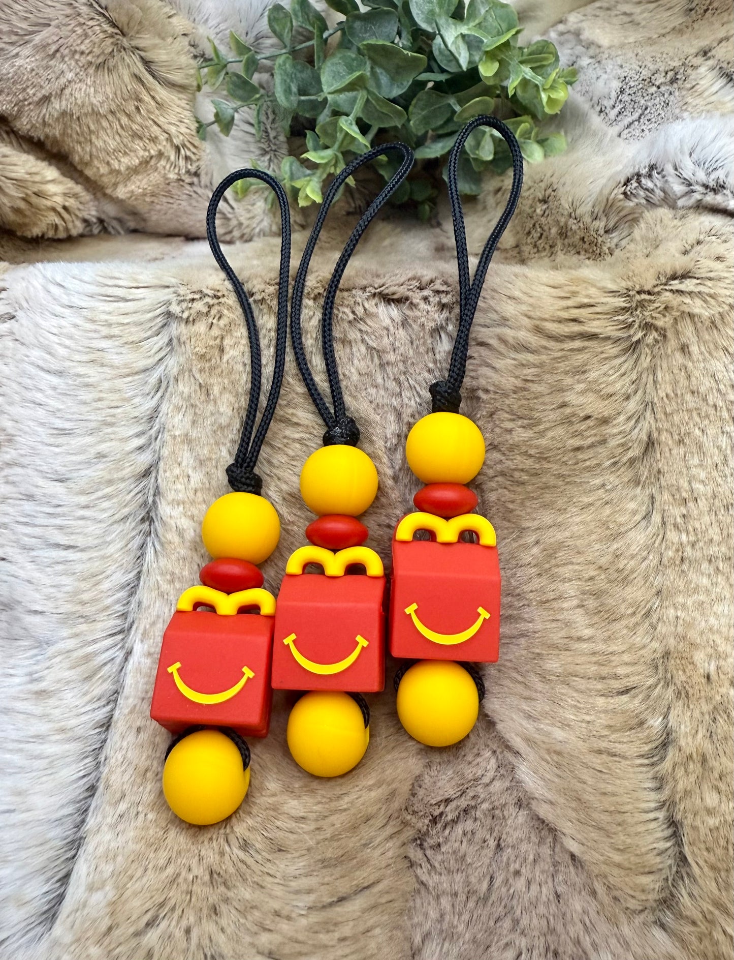 Happy meal zipper bag pull