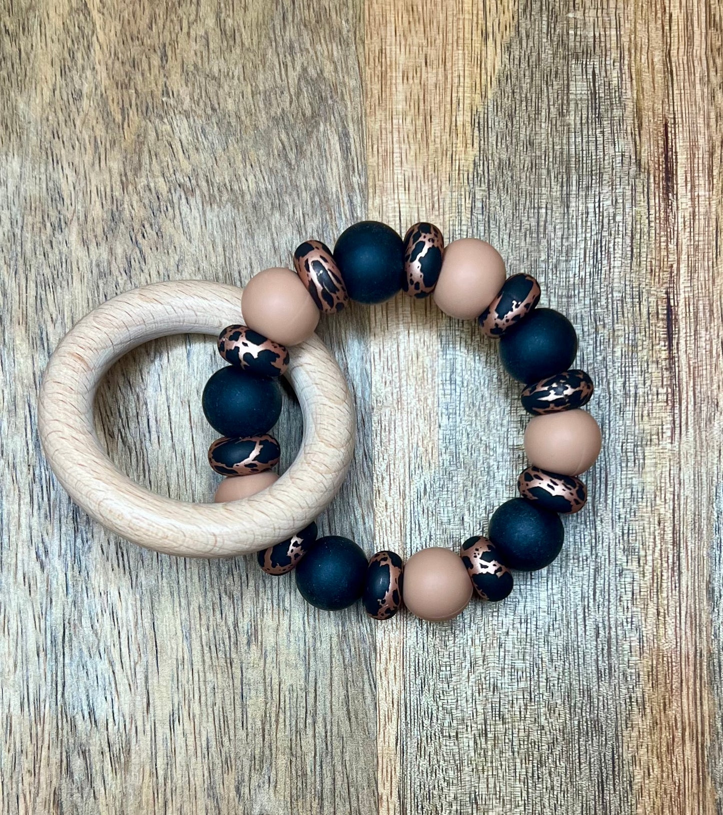 Bronze cow abacus teether ring