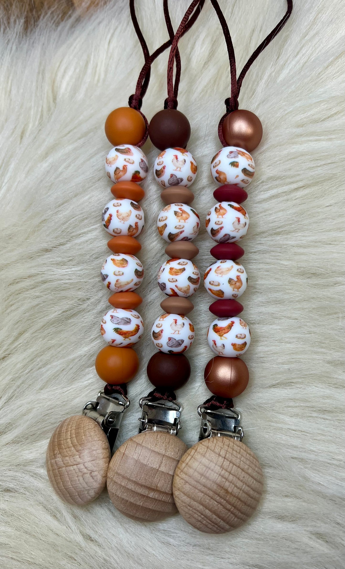 Chicken little pacifier clip