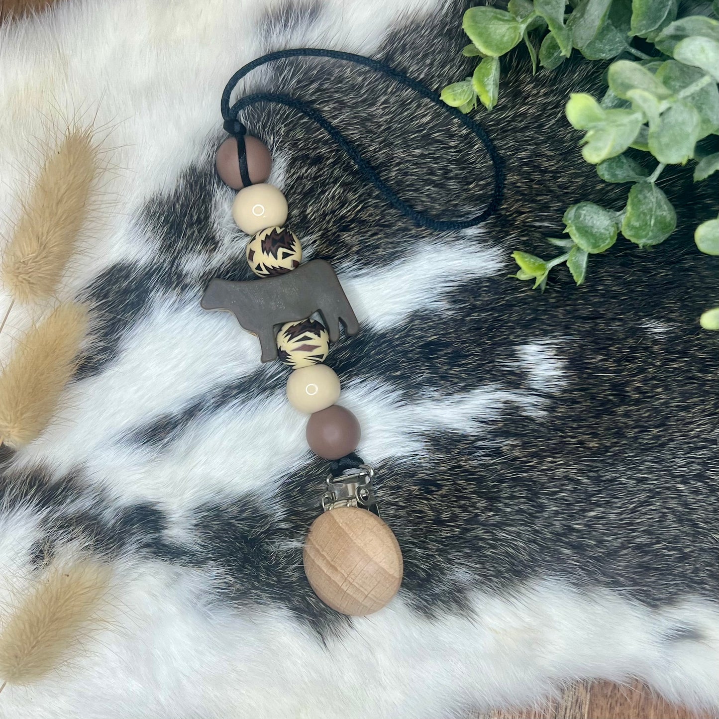 Aztec brown cow pacifier clip
