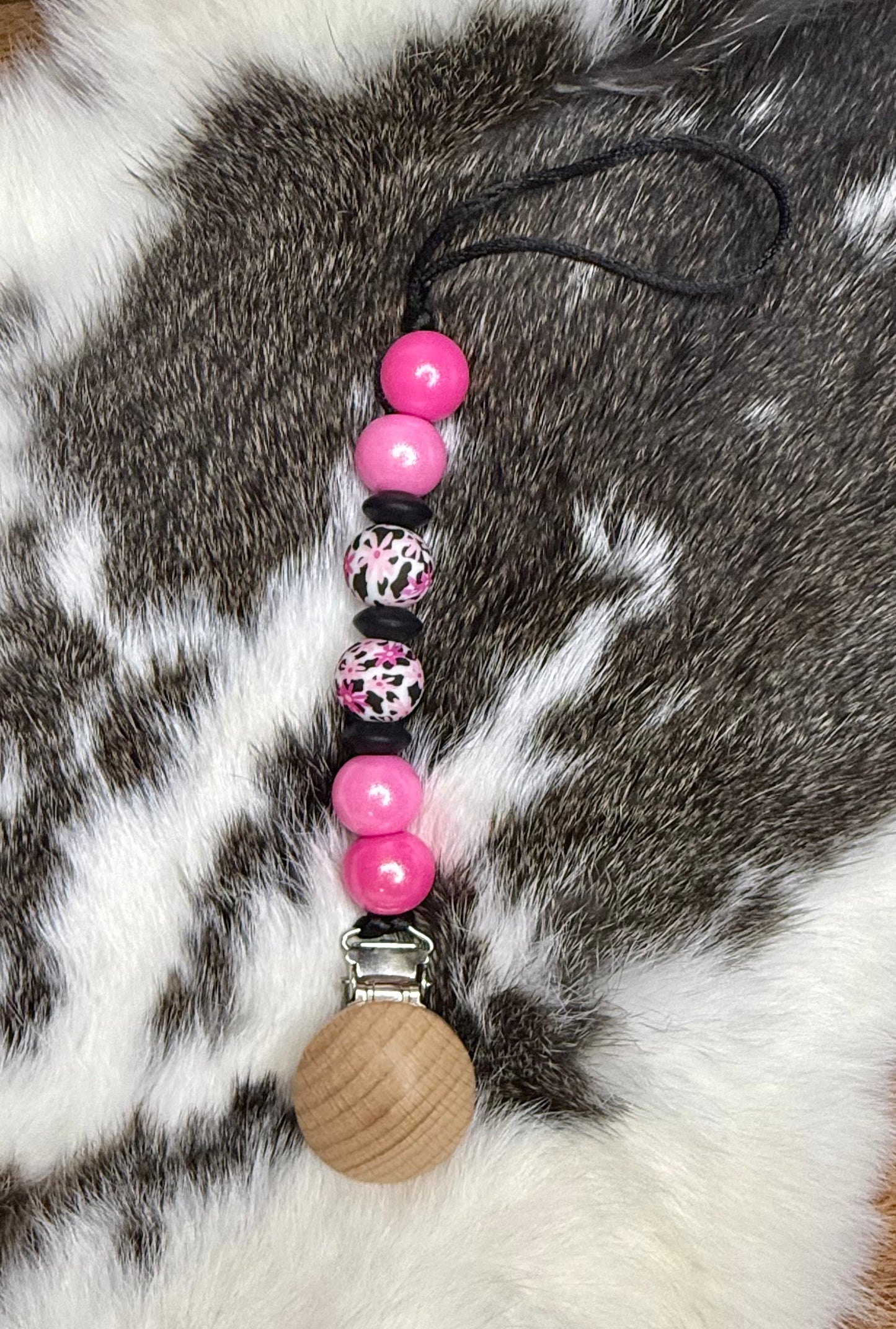 Cowprint pink daisy pacifier clip