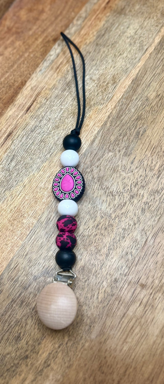 Pink concho pacifier clip