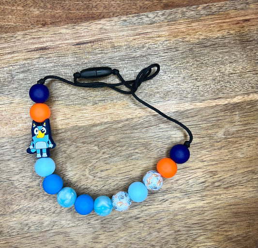 Blue doggy chew necklace