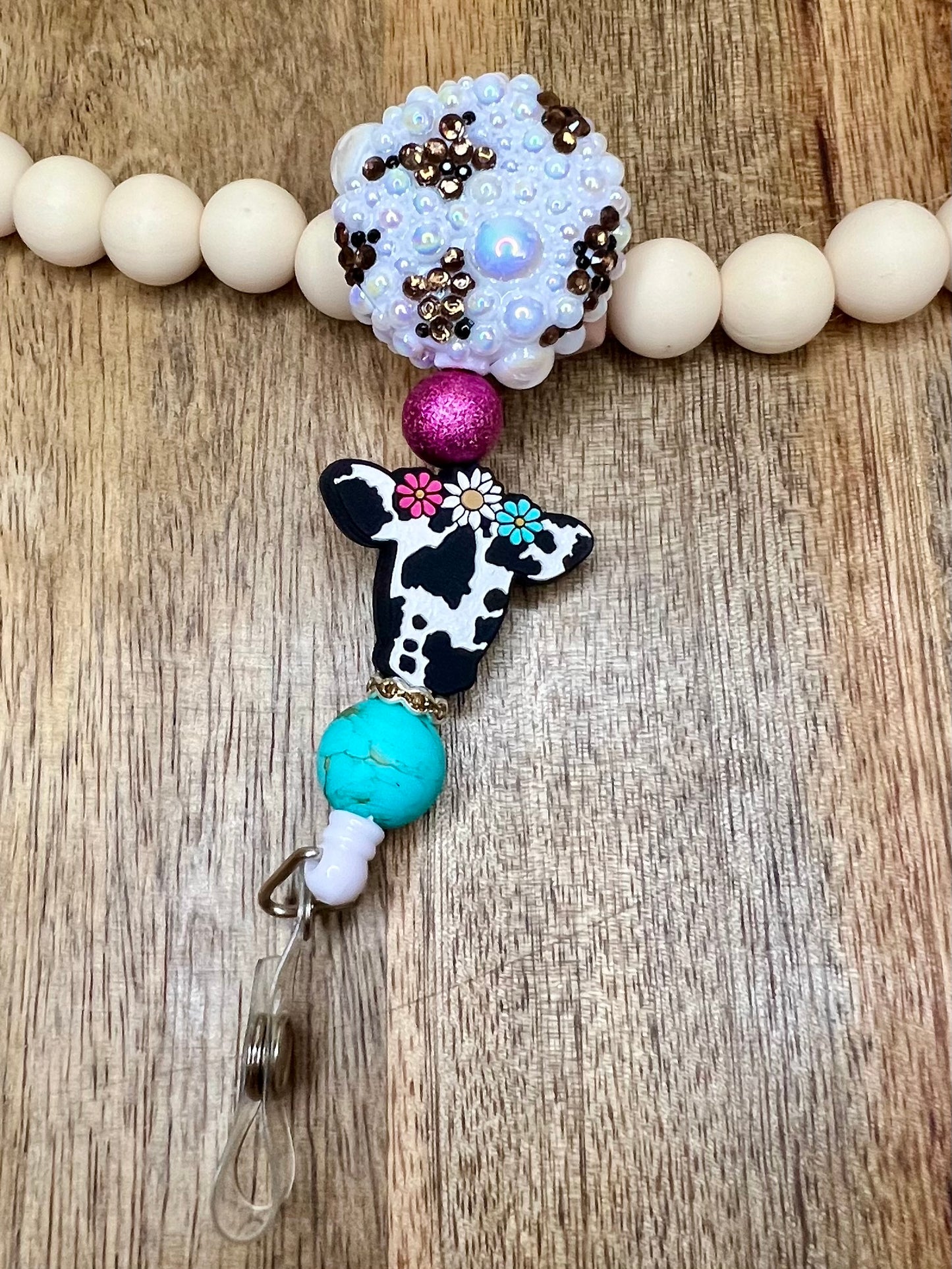 Daisy cow badge reel