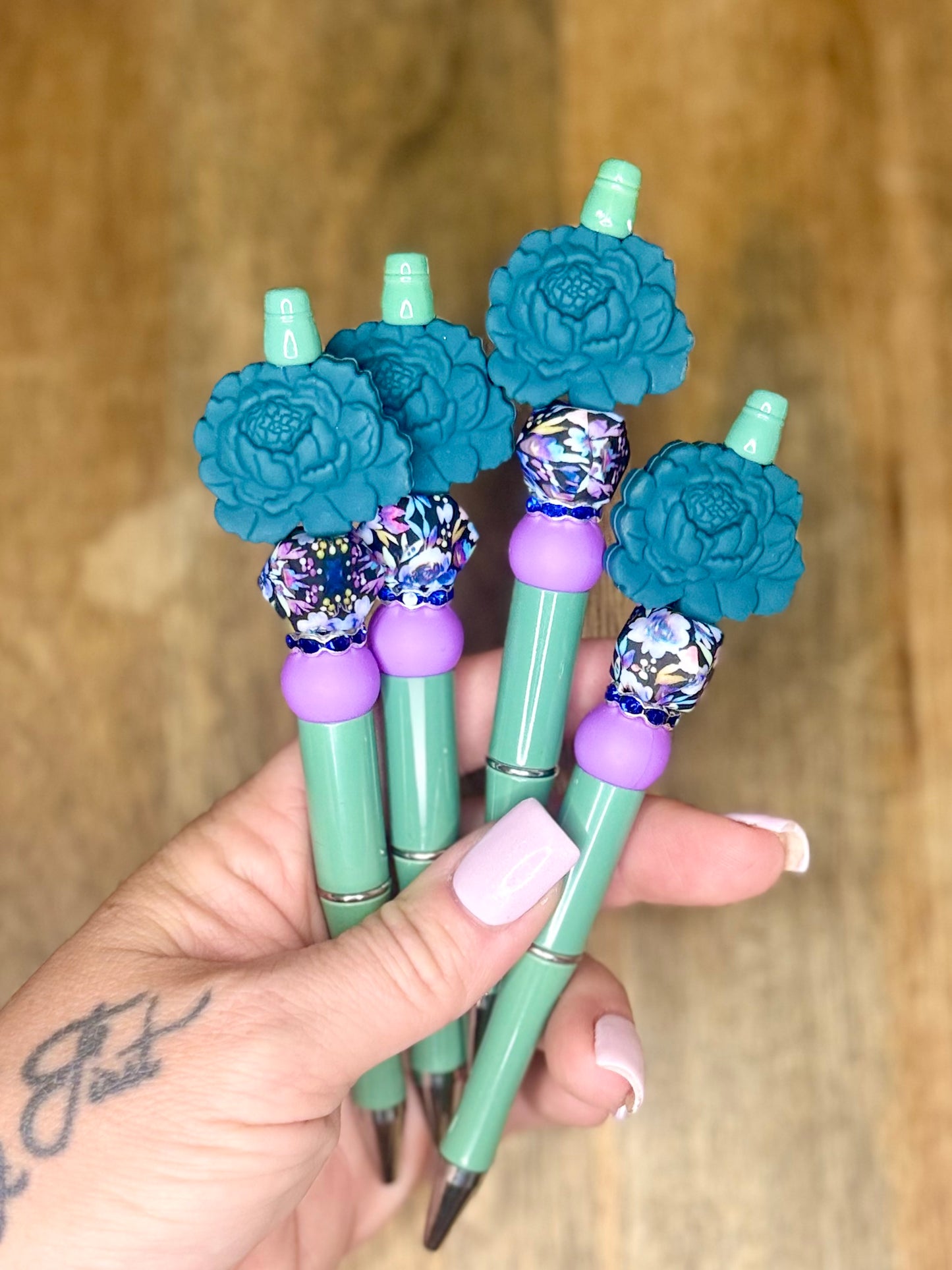 Teal floral pen