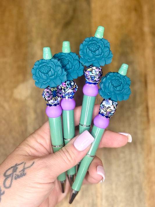 Teal floral pen