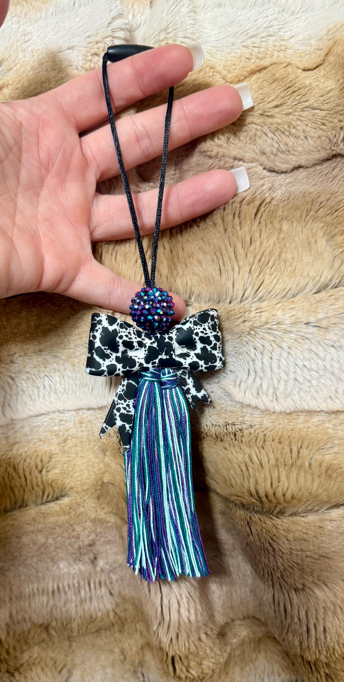 Purple punchy cowhide bow carcharm