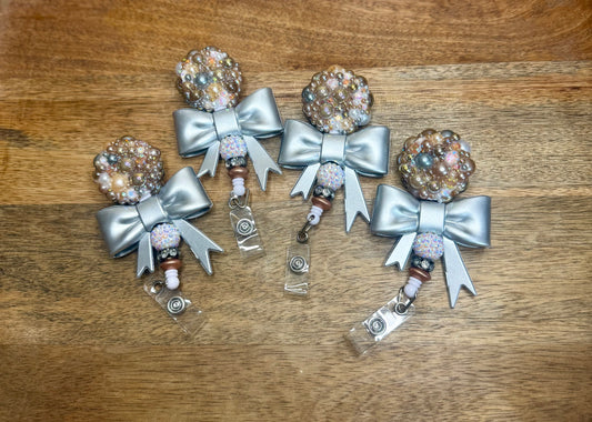 Metallic neutrals stone badge reel