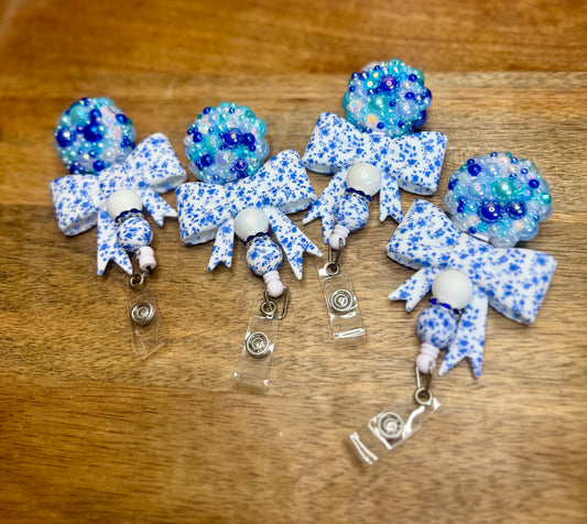 Blue floral stone badge reel
