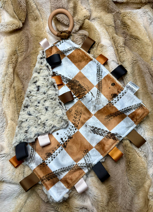 Tan checkered dirt life tag lovie