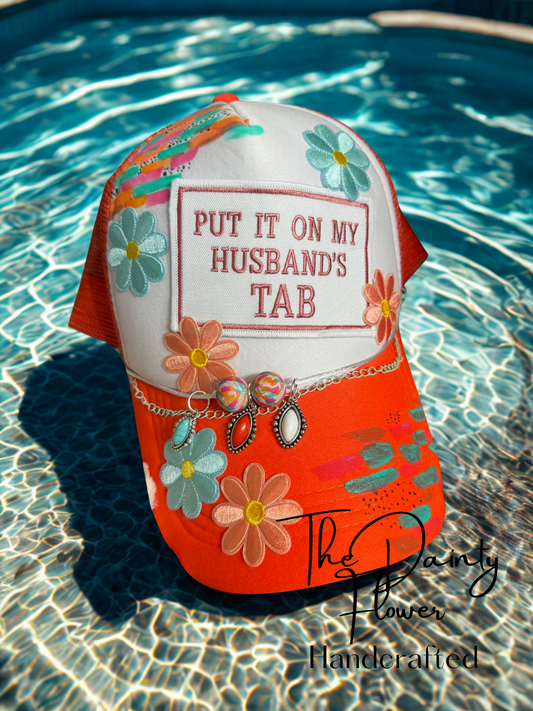 Put it on my husbands tab trucker hat
