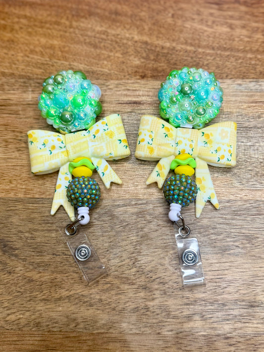 Main squeeze lemon stone badge reel