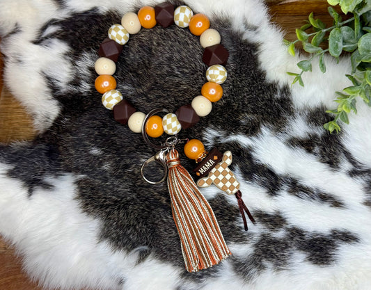 Mama rust checkered wristlet