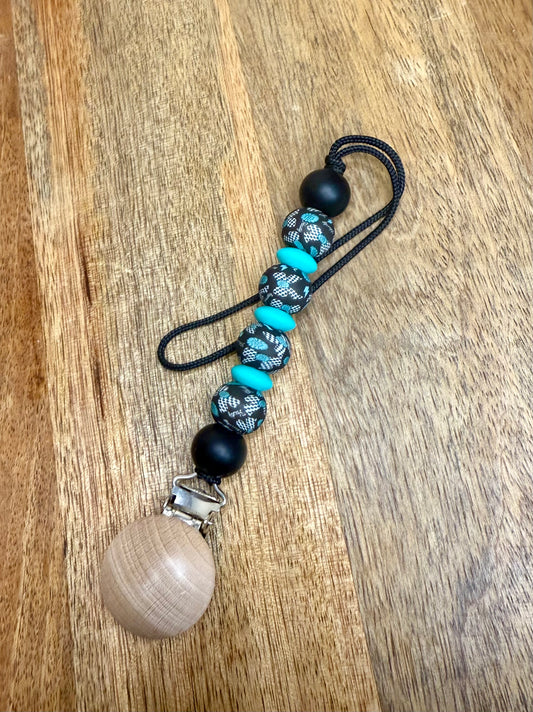 Checkered bows pacifier clip