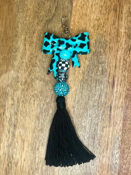 Turquoise cowprint bow keychain