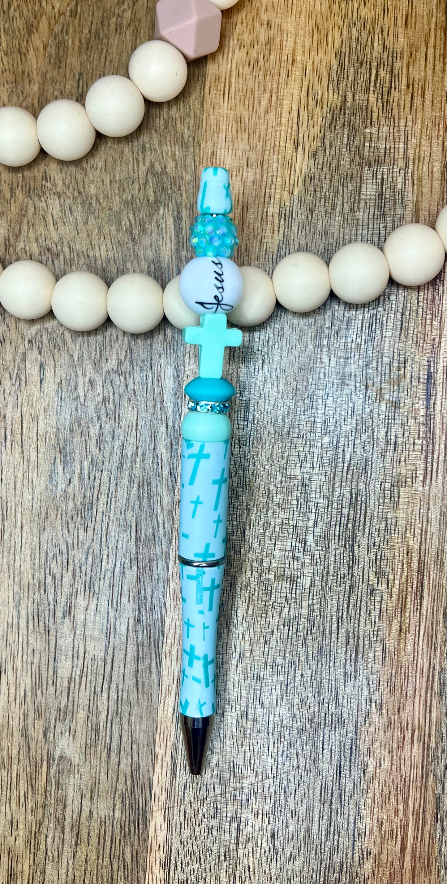 Tiny turquoise cross pen