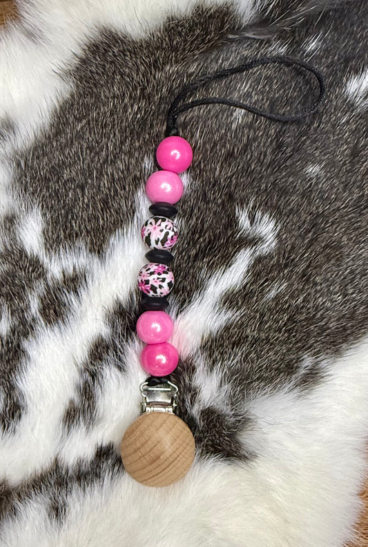 Cowprint pink daisy pacifier clip